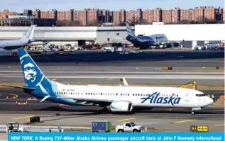  ?? — AFP ?? NEW YORK: A Boeing 737-900er Alaska Airlines passenger aircraft taxis at John F Kennedy Internatio­nal Airport in New York City on January 8, 2024.