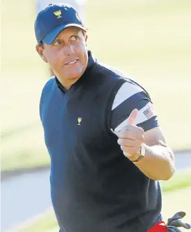  ?? /Sam Greenwood/Getty Images ?? In form: Phil Mickelson at the 14th hole of the Presidents Cup on Sunday.