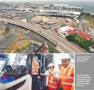  ??  ?? A bird's-eye view of the Penang Sentral hub. Chow showing reporters the bus ticket while exco member Dr Afif Bahardin (right) looks on.