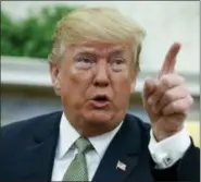  ?? THE ASSOCIATED PRESS ?? President Donald Trump talks with reporters during a meeting with Irish Prime Minister Leo Varadkar in the Oval Office of the White House on Thursday in Washington.