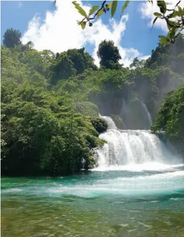  ??  ?? Making a splash … one of the swimming holes near Tuke village (right); an aerial of the cascades (inset).