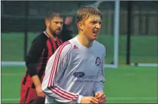  ??  ?? Rory Dowd in action at a rain-swept Oban community pitch last Saturday.