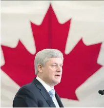  ??  PAUL CHIASSON/THE CANADIAN PRESS ?? Prime Minister Stephen Harper says it is offensive to wear a niqab while taking the oath of citizenshi­p.