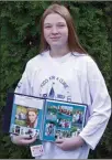  ?? Special to The Okanagan Weekend ?? Arielle Findlater, 12, shows off the scrapbook she made and brought to Parliament Hill in October as part of the Juvenile Diabetes Research Foundation’s Kids for a Cure Lobby Day.