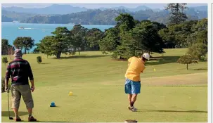  ?? GETTY (MAIN IMAGE); STUFF ?? Golfers at Waitangi are unimpresse­d at the prospect of an obstructed view if a hotel goes ahead just up the hill from the site of the Treaty signing.