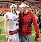  ?? [PHOTO BY NATE BILLINGS, THE OKLAHOMAN] ?? Baker Mayfield, left, and Lincoln Riley walk off the field after a 62-52 win at Oklahoma State on Nov. 4.