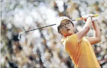  ?? Photo: GETTY IMAGES ?? Staying focused: Lydia Ko tees off on day two of the Australian Open at the Royal Canberra Golf Club yesterday. Ko, the overnight leader, shot a four-under 69 to be joint second, one shot behind Colombia’s Mariajo Uribe.