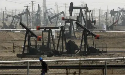  ?? Photograph: Jae C Hong/AP ?? Pumpjacks are seen in Bakersfiel­d, California.