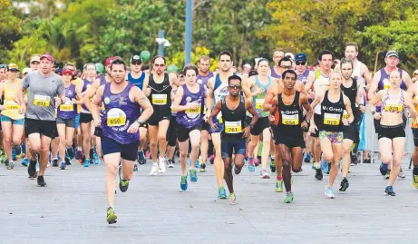  ?? POPULAR: The start of the half marathon at last year’s Townsville Running Festival. Picture: ZAK SIMMONDS ??