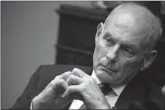  ?? The Associated Press ?? ROOSEVELT ROOM: White House chief of staff John Kelly listens as President Donald Trump speaks during a lunch with governors on June 21 in the Roosevelt Room of the White House in Washington. Trump says Kelly will leave his job at the end of the year.