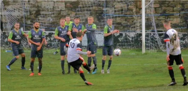  ?? ?? Bacup Borough skipper Michael Gervin with a free-kick against Nelson FC at the weekend