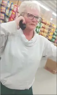  ?? Contribute­d ?? This still frame from a video allegedly shows a Penticton Dollarama employee making racist comments towards customers.