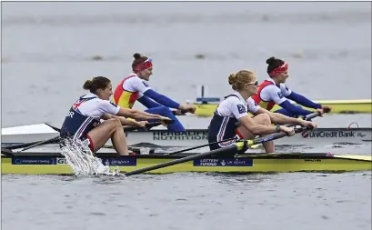  ??  ?? Polly Swann and Helen Glover hold off the Romanians to win gold in the European Championsh­ips