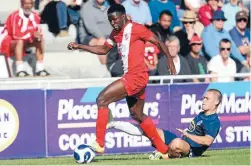  ??  ?? Handful: Sanni Issa, left, in action for Amicale FC in this year’s OFC Champions League final against Auckland City.