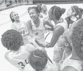  ?? Joe Buvid ?? Didi Richards (2) is the center of attention as she and her Cypress Ranch teammates celebrate winning the Class 6A Region III title and advancing to state.