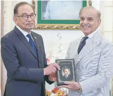 Anwar, Pakistan counterpar­t hold fruitful bilateral meeting - PressReader