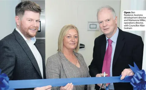  ??  ?? Open Ben Roylance, business developmen­t director, and Marieanne Miller, operations director, with Councillor Allan Graham