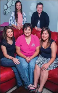  ?? WILLIAM HARVEY/TRILAKES EDITION ?? Desiree Skeya, back left, director of The Hope Movement, and house mom Toni Sampson stand behind some of the women living at the house, Erin Taber, from left, Wendi Barfield and Chistina Floyd.