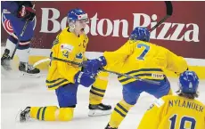  ?? JEFFREY T. BARNES/THE ASSOCIATED PRESS ?? Sweden’s Lias Andersson celebrates a goal in a 4-2 world junior semifinal win Thursday over the U.S.