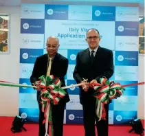  ?? ?? ■ Kaushik Ghosh, head of VFS Global Australasi­a and Italian Ambassador Marco Clemente officially inaugurate the main visa center in Taguig.