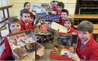  ??  ?? ●● Beech Hall School pupils with their Pandora’s Boxes