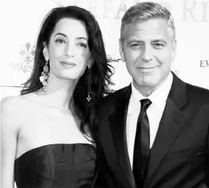  ?? ag ence france-presse / Gett y Imag es ?? Heart throb actor George Clooney will wed his fiancée, lawyer Amal
Alamuddin, in Venice on Monday before a vast cast of celebritie­s.