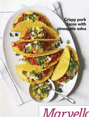  ??  ?? Crispy pork tacos with pineapple salsa