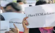  ?? SUBHANKAR CHAKRABORT­Y/ HT ?? TCS Lucknow employees protesting against the company’s decision to shift operations to Noida.