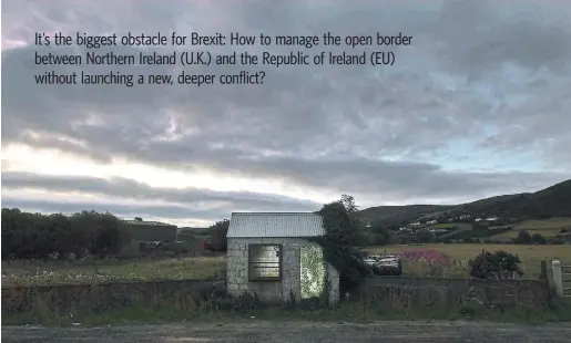  ?? CHARLES MCQUILLAN PHOTOS GETTY IMAGES ?? Top, a former customs guard hut illuminate­d on the border in Ravensdale, Ireland. During the Northern Ireland Conflict decades ago, the border was controlled by police and soldiers.