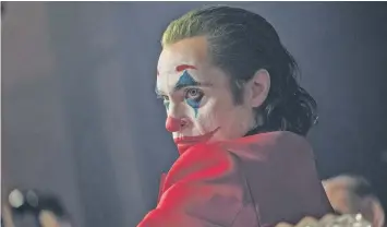  ?? NIKO TAVERNISE/WARNER BROS. PICTURES VÍA AP ?? Joaquin Phoenix en una escena de Joker