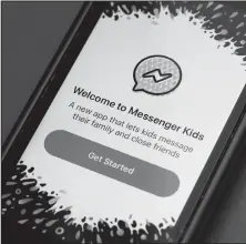  ?? Richard Drew/AP ?? Sleep mode: In this Feb. 16 photo, Facebook's Messenger Kids app is displayed on an iPhone in New York. Facebook is adding a “sleep” mode to its Messenger Kids service so parents can limit how much time children spend on it.