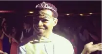  ??  ?? Seventeen-year-old Nasir Fleming of Connecticu­t is crowned Prom Queen at his Danbury High School dance. Students originally wanted Fleming to serve as both King and Queen but, although gay, he elects the tiara as a statement against transphobi­a.