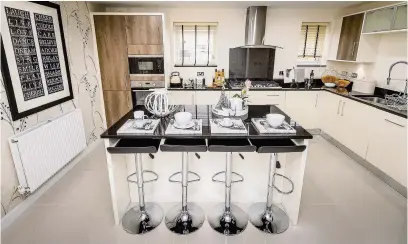  ??  ?? A modern family kitchen inside a Barratt Homes house
