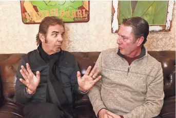  ?? SUBMITTED ?? Jonathan Cain, left, talks to Bart Herbison about co-writing Journey’s “Don’t Stop Believin’.”