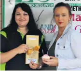  ??  ?? Natasha Futcher (right) won a pedicure from The Nail Shop, as well as owers to the value of R500 from Spar 5 Ways Mall. Sales consultant Linda Vorster presented her prize