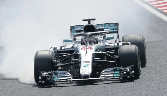  ??  ?? Mercedes’ Lewis Hamilton steers his car during a practice session ahead of the Hungarian Grand Prix.