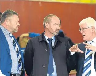  ??  ?? Kilmarnock’s new manager Steve Clarke (centre) with directors Billy Bowie (left) and John Kiltie