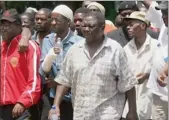  ?? PICTURE: AP ?? TORTURE CLAIMS: Morgan Tsvangirai, MDC leader, and other activists outside court in Harare, Zimbabwe, in March 2007. They were taken to hospital for injuries, allegedly from police torture, two days after they were arrested for trying to attend an...