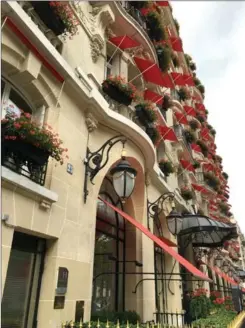  ??  ?? On the prestigiou­s avenue Montaigne, the Hotel Plaza Athenee is a palace hotel featuring a Dior spa and a Michelin three-starred restaurant by Alain Ducasse.
