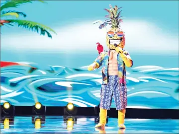  ??  ?? The Pineapple performs on Fox’s “The Masked Singer.” — Michael Becker, Fox picture