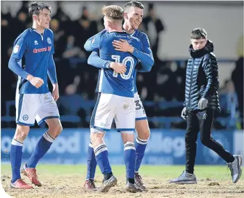  ??  ?? Rochdale celebrate their win over Millwall, but Spurs aren’t popping corks about their pitch