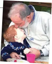  ??  ?? A loving connection to the end: Matty Crozier and his grandfathe­r