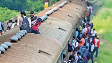  ?? ?? Commuters travel on an overcrowde­d train during a nationwide strike which has hit transport services and hospitals (AFP Photo)