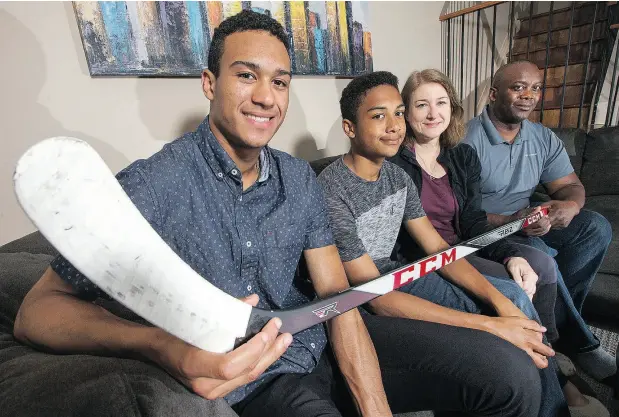  ?? WAYNE CUDDINGTON / POSTMEDIA NEWS ?? Oshawa Generals forward Serron Noel, left, with his family including second from left, brother Kalen, mother Dara Lloyd and father Dean Noel at their Ottawa home. Noel is being projected as a top 15 pick in this year’s NHL entry draft.