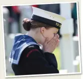  ??  ?? EMOTIONAL: A naval cadet yesterday