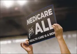  ?? Jim Watson AFP/Getty Images ?? SEN. BERNIE SANDERS’ focus on a Medicare-for-all healthcare system in his 2016 presidenti­al campaign transforme­d the issue into one with mass appeal.