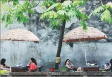  ?? PHOTOS BY WEI XIAOHAO / CHINA DAILY, AND WANG QIMING AND WANG JIANZHONG / FOR CHINA DAILY ?? From top: The Suzhou Museum, designed by world-famous Chinese-American architect I.M.Pei; a waterway of the ancient town Tongli; visitors take a rest at a roadside tea shop at Pingjiang Road.