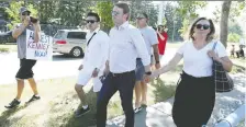  ?? JIM WELLS ?? Health Minister Tyler Shandro and his family were met by hecklers and protests at a Canada Day event.