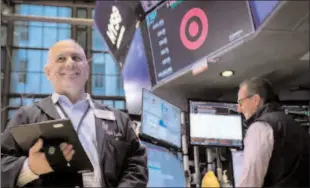  ?? -REUTERS ?? NEW YORK CITY
Traders work on the floor at the New York Stock Exchange (NYSE) in New York City, US.