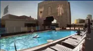  ??  ?? The pool deck at Loews Hollywood Hotel looks over a monolith in an adjacent mall.